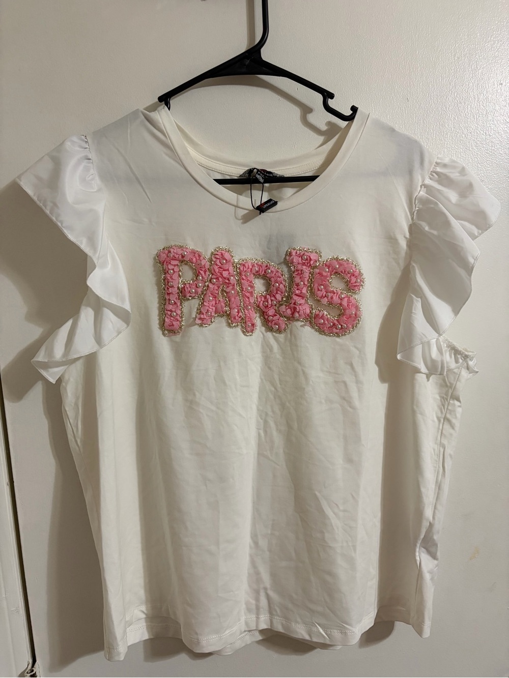 Women’s White Ruffle Sleeve Top with Pink “PARIS” Appliqué